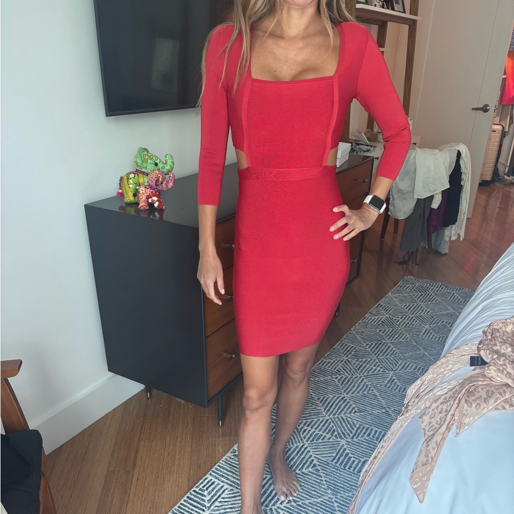 Marciano dress in red. Full length zipper back closure. Cut out on the sides.